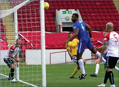  ??  ?? NO STOPPING THAT: Boyle soars unchalleng­ed to head home Killie’s second goal with the Clyde defenders left helpless