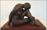  ??  ?? “Seated Nude”; bronze by Donna Colburn