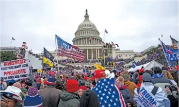  ?? AP PHOTO/JOSE LUIS MAGANA ?? Rioters loyal to President Donald Trump rally at the U.S. Capitol in Washington on Jan. 6, 2021.