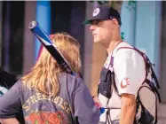  ?? BETH NAKAMURA/THE OREGONIAN ?? Michael Reinoehl is seen during a protest in front of Mayor Ted Wheeler’s residence on August 28 in Portland, Ore. He was the prime suspect in a Portland killing Thursday.