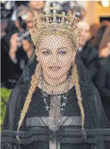  ?? FOTO: AFP ?? Ein Hingucker: Madonna im Frühjahr bei der Gala des Metropolit­an Museum in New York.