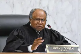  ?? DAVID BARNES / AJC 2017 ?? Justice Robert Benham, appointed to the Georgia Supreme Court in 1989, became the first African American on the state’s highest court. He announced Thursday he will retire from the bench in May, nine months early.