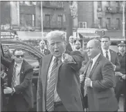  ?? Spencer Platt/getty Images/tns ?? Former President Donald Trump visits a bodega in the Harlem neighborho­od of upper Manhattan where a worker killed a man who had assaulted him in 2022, on Tuesday, in New York City. The worker, Jose Alba, was arrested, but the Manhattan district attorney dropped the charges for lack of evidence. Trump visited the bodega after spending a second day in court where he faces 34 felony counts of falsifying business records in the first of his criminal cases to go to trial.