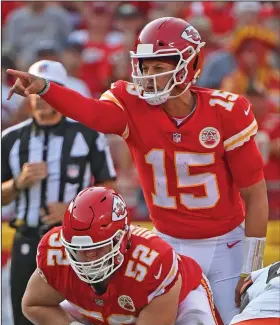  ?? (AP/Peter Aiken) ?? Patrick Mahomes (above) and the Kansas City Chiefs travel to face Lamar Jackson and the Baltimore Ravens today in a matchup of two MVP quarterbac­ks. Kansas City won 34-20 at Baltimore last year.