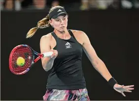  ?? Clive Brunskill / Getty Images ?? Elena Rybakina plays a shot in the semifinals against Victoria Azarenka on Thursday. Rybakina will face No. 5 Aryna Sabalenka in Saturday’s final.