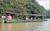  ??  ?? Motored canoes are used to access the Itamandi Eco Lodge in the Amazon jungle near Tena, Ecuador.