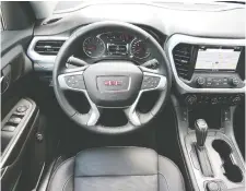  ??  ?? This handsomely styled 2019 GMC Acadia has stitched padded panels on the dash, door pads, console and steering wheel.