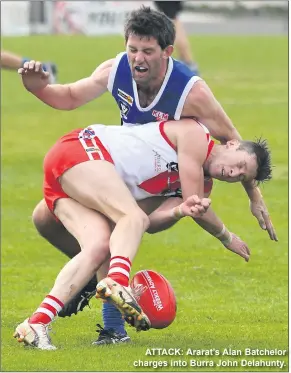  ??  ?? ATTACK: Ararat’s Alan Batchelor charges into Burra John Delahunty.