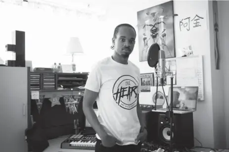  ?? MELISSA RENWICK/TORONTO STAR ?? Akeem Raphael, 26, is shown in the modest studio he’s built in his apartment.