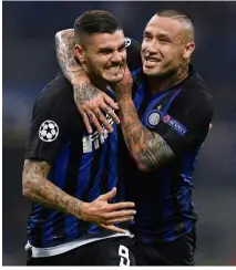  ?? — Reuters ?? I did it: Inter Milan’s Mauro Icardi (left) celebratin­g after scoring their first goal with Radja Nainggolan in the Champions League match against Tottenham Hotspur on Tuesday.