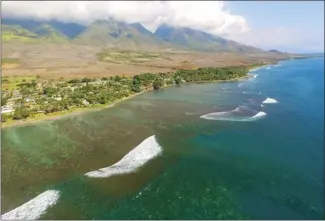  ?? MAUI DIGITAL IMAGES photo ?? An aerial shot of West Maui’s Na Papalimu O Pi‘ilani shows reef area rich with data for researcher­s. Decades of reef studies were compiled recently by The Nature Conservanc­y in “Atlas of the Reefs of West Maui.”