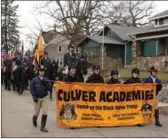  ?? PROVIDED TO CHINA DAILY ?? Chinese student Tsz Ham “Kevin” Tai (above right), who will lead the Culver Military Academy Black Horse Troop in the Presidenti­al Inaugural Parade on Friday, practices with the troop on Sunday in Culver, Indiana.