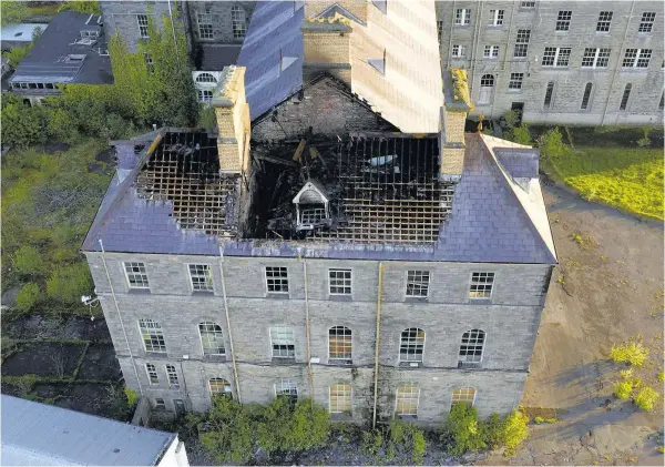  ??  ?? The damage to the roof can be seen clearly in this drone photograph by Rory O’Brien.