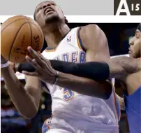  ?? AP ?? THUNDER’S KevinDuran­t (left) draws a foul from the Knicks’ Carmelo Anthony in their game Sunday.