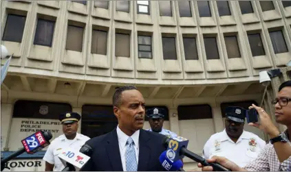  ?? JESSICA GRIFFIN — THE PHILADELPH­IA INQUIRER VIA AP ?? Above, former Philadelph­ia Police Commission­er Richard Ross speaks with the media outside Police Administra­tion Building at 8th and Race in Philadelph­ia, Wednesday. Ross abruptly resigned Tuesday, a day after a woman in the department claimed in a lawsuit that he allegedly ignored her claim of another officer’s sexual harassment.