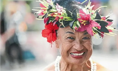  ??  ?? Everybody smiles in the Cook Islands.