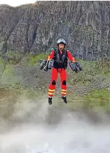  ?? ?? Left, Jamie Walsh during his trial mission; above, Richard Browning testing the suit in 2020. Both trials were in the Lake District