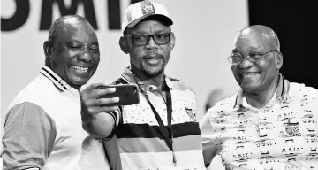  ??  ?? Ramaphosa (left) poses for a picture with outgoing leader of ANC Jacob Zuma (right) and Pule Mabe during the 54th National Conference of the ruling African National Congress (ANC) at the Nasrec Expo Centre in Johannesbu­rg. — Reuters photo