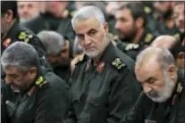  ??  ?? OFFICE OF THE IRANIAN SUPREME LEADER VIA AP In this file photo released by an official website of the office of the Iranian supreme leader, Revolution­ary Guard Gen. Qassem Soleimani, center, attends a meeting with Supreme Leader Ayatollah Ali Khamenei...