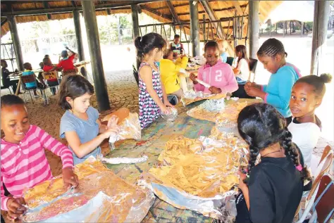  ??  ?? Children enjoying themselves at an art camp