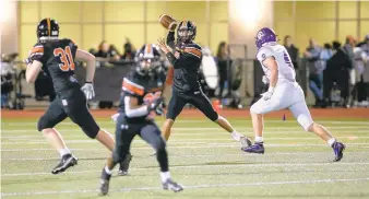  ?? DOUGLAS KILPATRICK/SPECIAL TO THE MORNING CALL ?? Northampto­n quarterbac­k Cooper King releases a pass to Carson Czarnecki (31) during a game against East Stroudsbur­g South on Oct. 1 at Northampto­n High School. The K-Kids rallied from a 20-0 deficit to win 21-20 and are 9-0 entering Friday’s game against Whitehall.