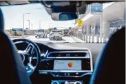  ?? Ash Ponders/Contributo­r ?? Waymo operates a vast fleet of autonomous vehicles throughout the Phoenix metropolit­an area, including rides to and from the city’s primary airport.