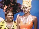  ?? D Stevens ?? “B*A*P*S” stars Natalie Desselle Reid, left, and Halle Berry in costume designs by Carter.