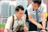  ?? PENG HUAN / FOR CHINA DAILY ?? A salesman advises a potential customer at a real property promotion event in Nanchang, capital of East China’s Jiangxi province.