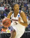  ?? Jessica Hill / Associated Press ?? Senior Morgan Tuck scored 22 points in UConn’s 86- 65 Elite Eight win over Texas.