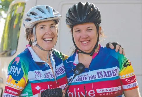  ??  ?? WORTHY CAUSE: Cairns midwife Mary McGuiness (left), pictured with Ride for Isabel pack leader Jayne Steinborne­r, says the event is close to her heart after having worked with many families who have lost babies. BELOW: Riders follow a scenic route past Walsh’s Pyramid.