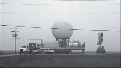  ?? Photo by Nils Hahn ?? OVERHAUL— The National Weather Service is conducting repairs to the radar site on the Beam Road.