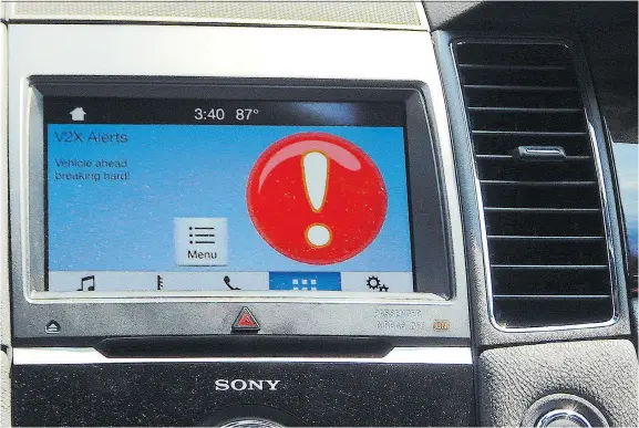  ?? BRIAN HARPER ?? Ford’s Cellular Vehicle to Everything (C-V2X) system will, among other things, warn motorists of dangerous situations ahead of them.