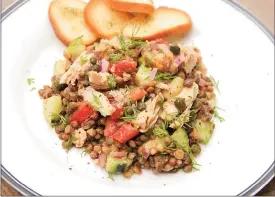  ?? Associated Press photo ?? This photo shows a lentil and salmon salad with smoky mustard dressing in Coronado, Calif.