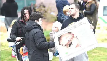  ??  ?? Supporters react to the announceme­nt that the European court of human rights refused to intervene in the case of Alfie Evans outside Alder Hey children’s hospital in Liverpool. — AFP photo