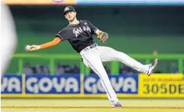  ?? ADAM SACASA/STAFF FILE PHOTO ?? The Marlins are showing confidence in shortstop JT Riddle. He has been steady in the field and at the plate until a recent dip offensivel­y.