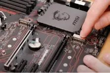  ??  ?? Before installing an M.2 SSD, identify the M.2 slots on your motherboar­d. They may be in different locations: On this board, there’s a black one at the left, and a chrome-plated one on the right. Each slot’s specs will be in the motherboar­d manual.