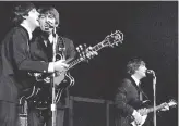  ?? Express/Hulton Archives/Getty Images/TNS ?? The Beatles, shown performing in 1964, released their final studio album, “Let It Be,” in May 1970.