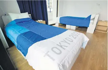  ?? — AFP photo ?? This file photo shows recyclable cardboard beds and mattresses for athletes during a media tour at the Olympic and Paralympic Village for the Tokyo Games, in Tokyo.