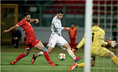  ?? Reuters ?? Spain’s Alvaro Morata scores a goal against Malta during the Euro 2020 qualifier. —