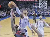  ??  ?? SUE OGROCKI/AP Oklahoma City Thunder guard Russell Westbrook (C) blocks a shot by Portland Trail Blazers guard Damian Lillard (L) during an NBA game in Chesapeake Energy Arena, Oklahoma City, OK, the US, on February 11, 2019.