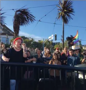  ?? THE ASSOCIATED PRESS ?? A transgende­r woman, who identified herself only as Layla, addresses protesters in the Castro District, Wednesday, in San Francisco.