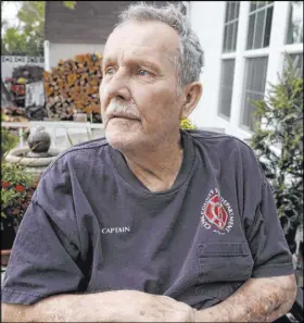  ??  ?? Retired Clark County fire Capt. Stanley Grismanaus­kas spent hours searching for people to guide to the roof to be evacuated.