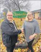  ?? SUBMITTED ?? Peter Murray, chairman of the board at Dykeland Lodge, is shown congratula­ting Krista Beeler on her recent appointmen­t as administra­tor of Dykeland Lodge in Windsor.