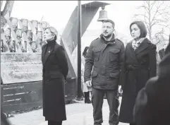  ?? ?? Allied against evil: Zelensky with his wife (left) and Moldova’s Sandu honor Ukrainians killed in 2014 pro-European Union demonstrat­ions.