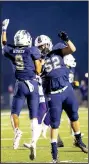  ?? Special NWA Democrat-Gazette/ DAVID BEACH ?? Brandon Humes and Trenton Davis celebrate Friday after Humes’ touchdown in the second quarter at Wolverine Stadium in Centerton.