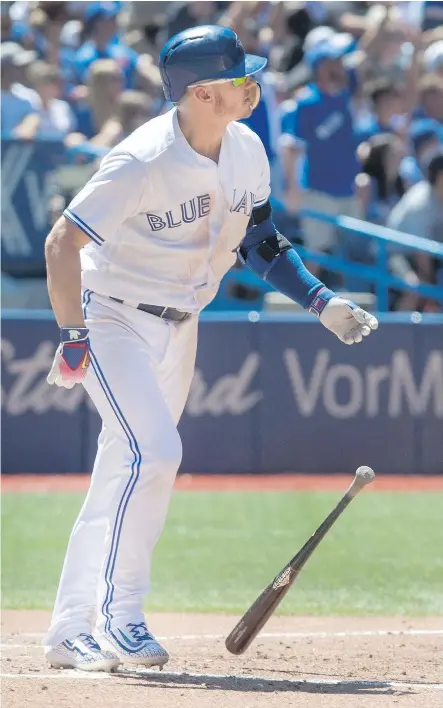  ?? — THE CANADIAN PRESS ?? The Blue Jays’ Josh Donaldson watches the ball leave the park in the fifth inning of a game against the Houston Astros in Toronto on Saturday. The three-run homer put the Jays in the lead.