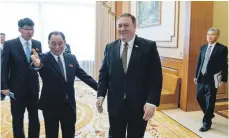  ?? AP ?? US Secretary of State Mike Pompeo, centre, and senior North Korean official Kim Yong-chol, left, in Pyongyang yesterday