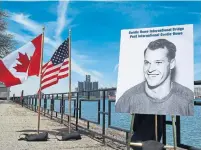  ?? DAVE CHIDLEY/THE CANADIAN PRESS ?? A photo of Gordie Howe was unveiled at the announceme­nt the bridge will be named the Gordie Howe Internatio­nal Bridge.