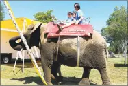  ?? File photo / Hearst Connecticu­t Media ?? An elephant from Commerford at the 2015 Goshen Fair.