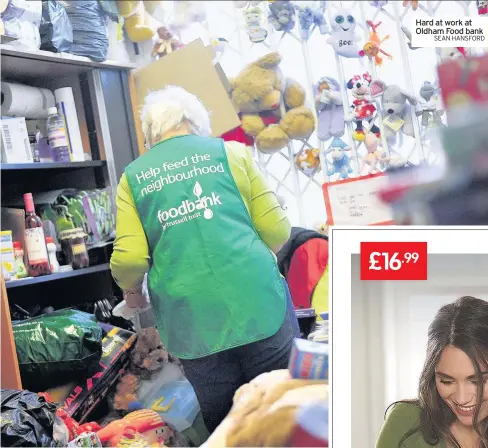  ?? SEAN HANSFORD ?? Hard at work at Oldham Food bank